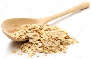 Rolled Oats on Wooden Spoon